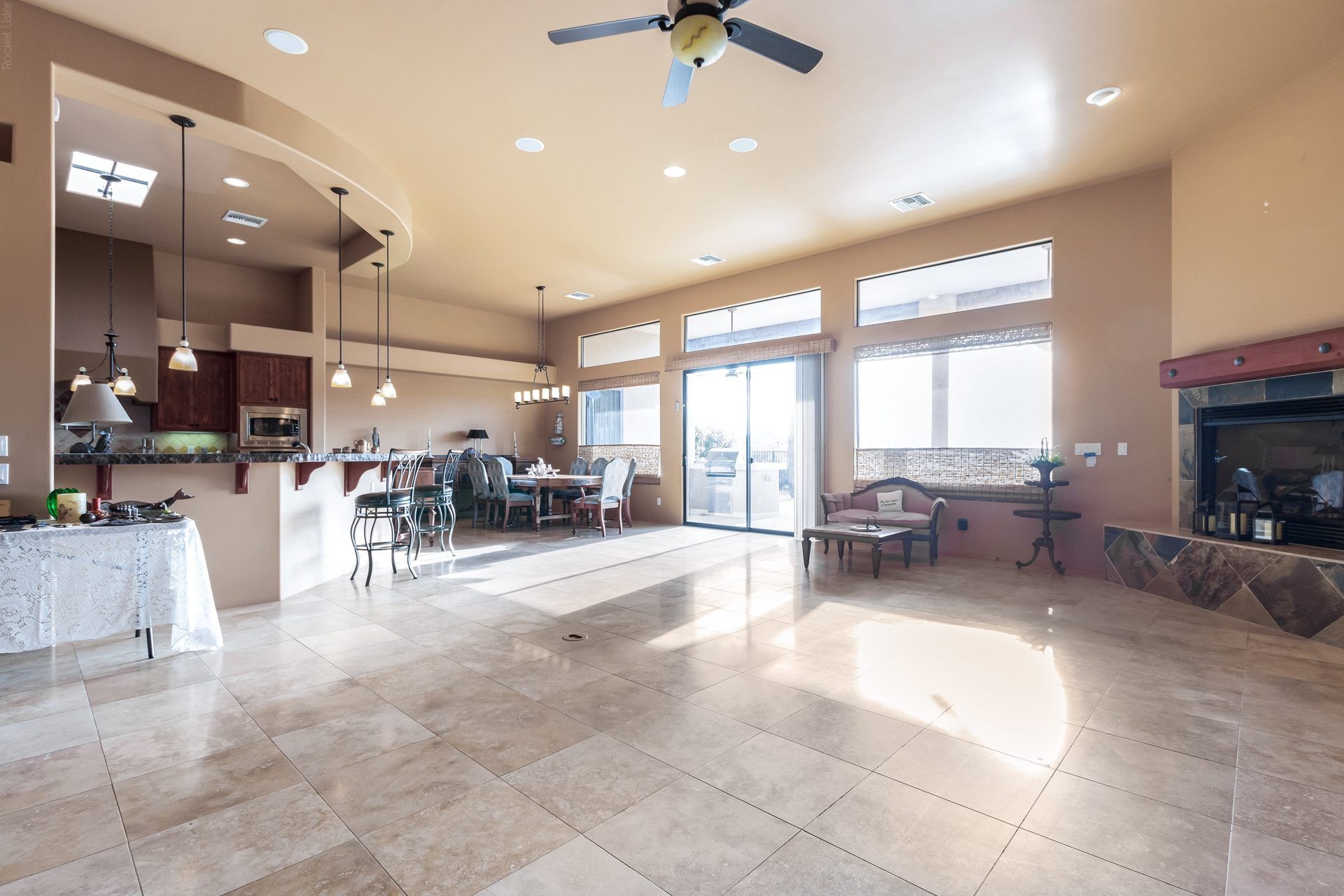 Open great room flowing into the kitchen and dining area